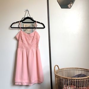 Blush pink homecoming dress with a slitted back